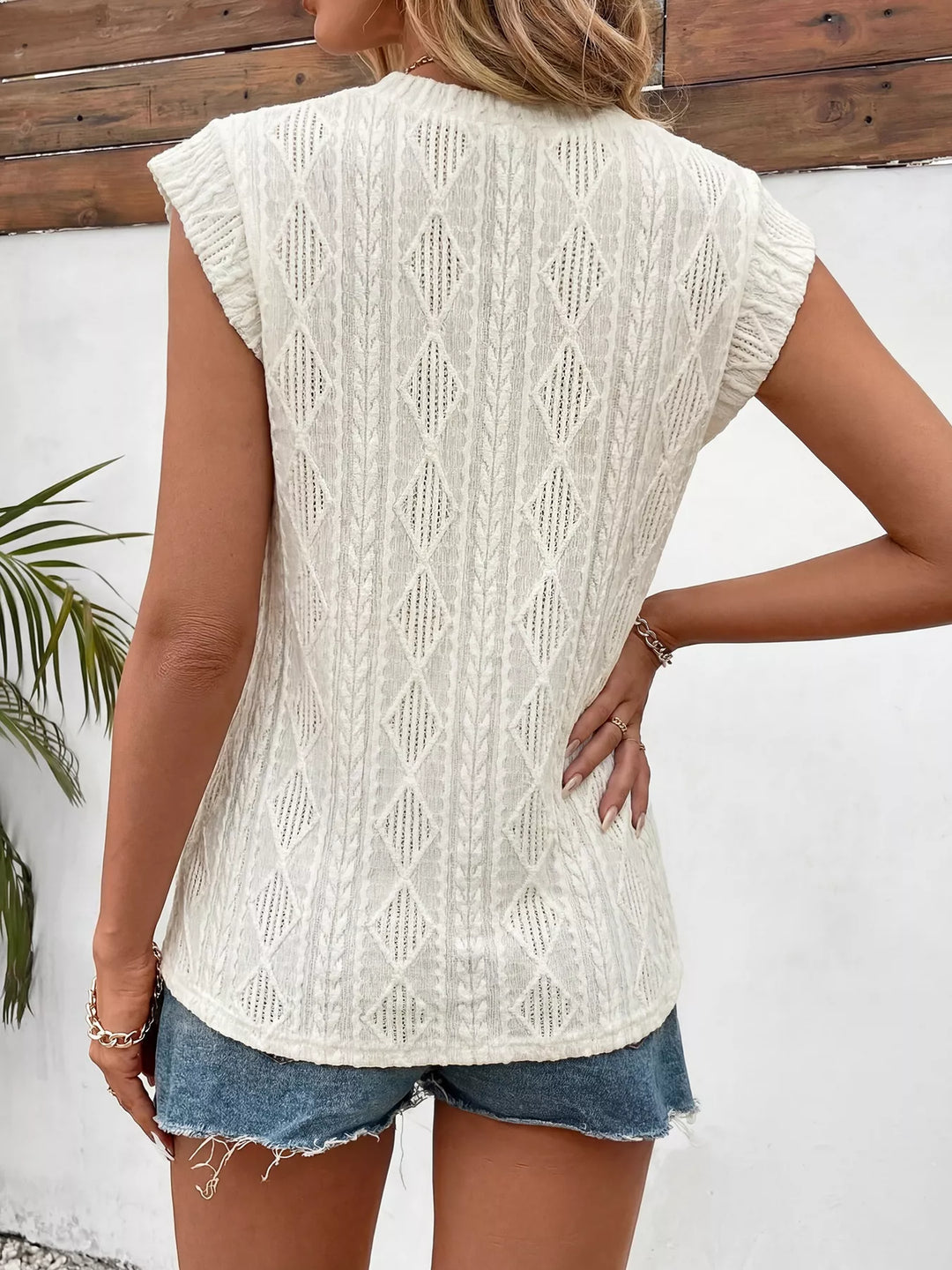 Openwork cable-knit top with ruffle cap sleeves