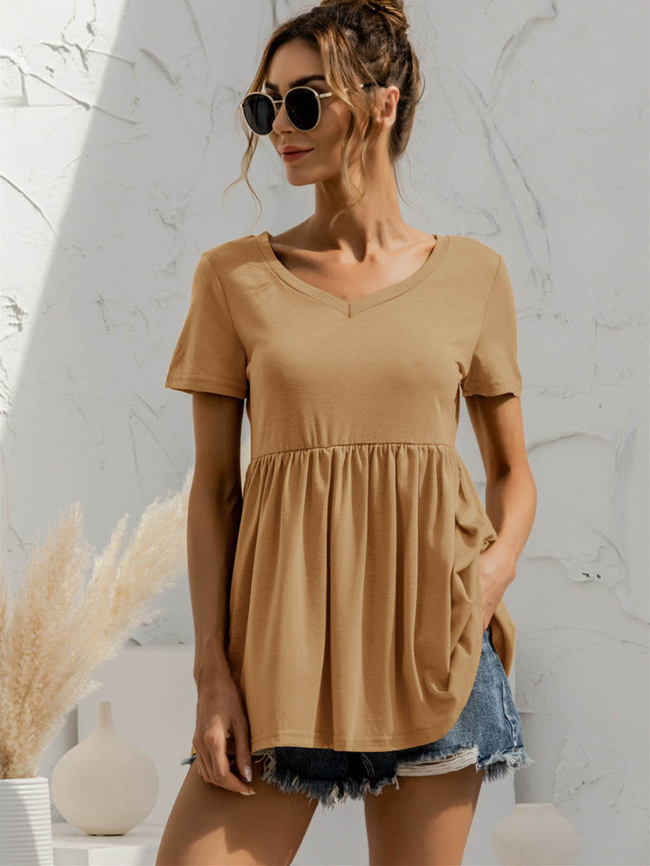 Khaki V-neck babydoll top with short sleeves and empire waist