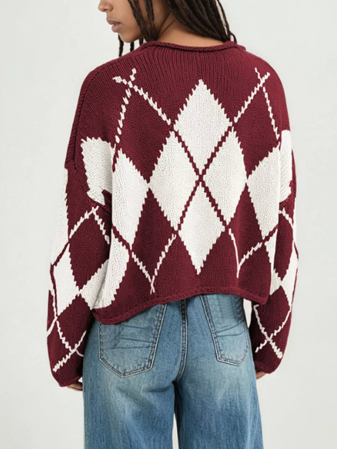 Argyle knit dropped shoulder sweater with ribbed trim