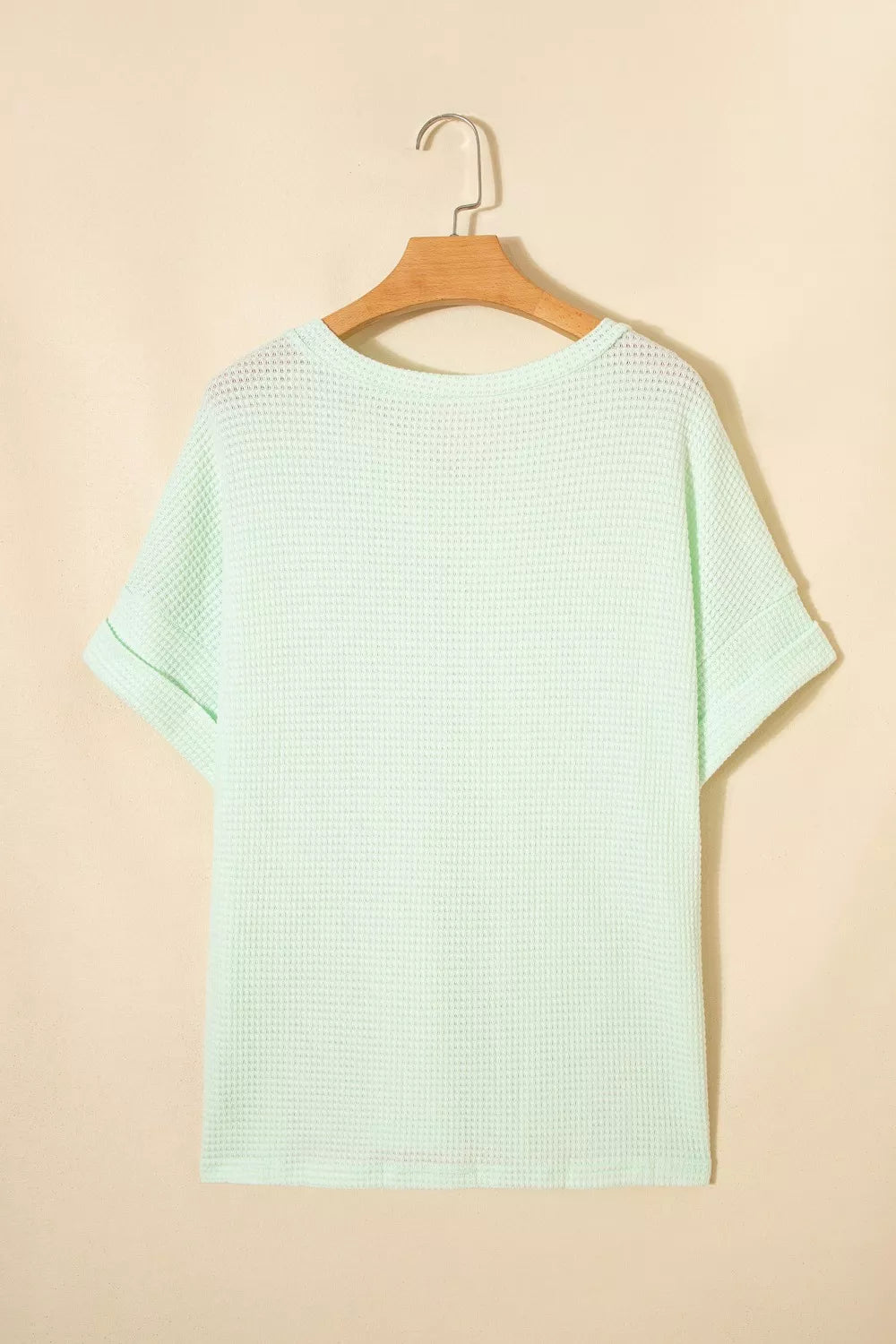 Plus size waffle knit V-neck top with cuffed short sleeves