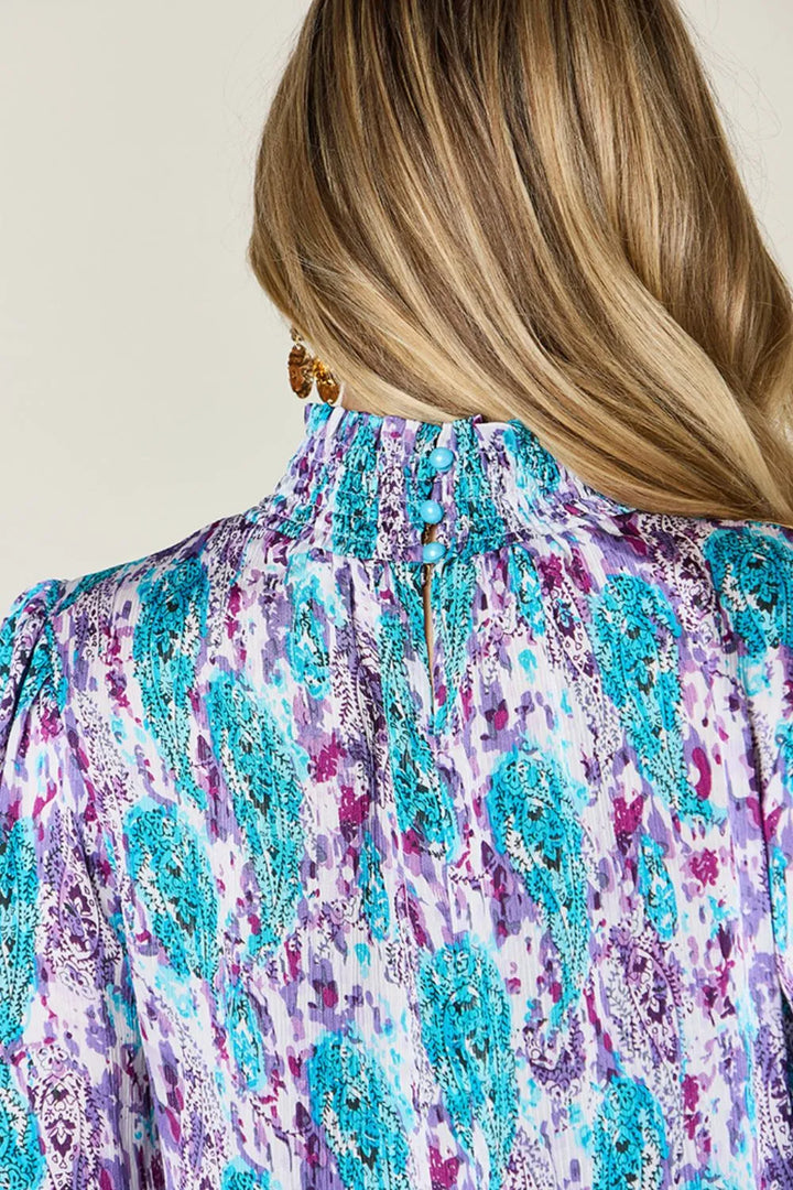 Printed smocked frill mock neck long sleeve blouse