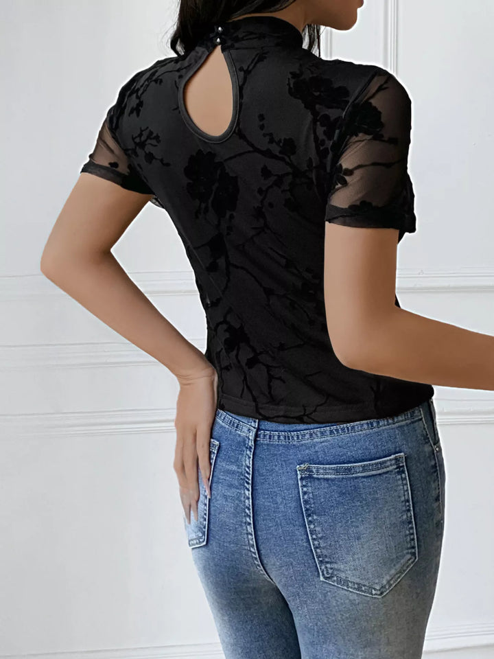 Floral mesh cutout top with mock neck and short sleeves