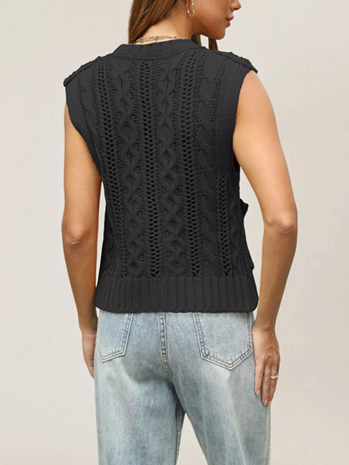 Cable knit button-down sweater vest with patch pockets