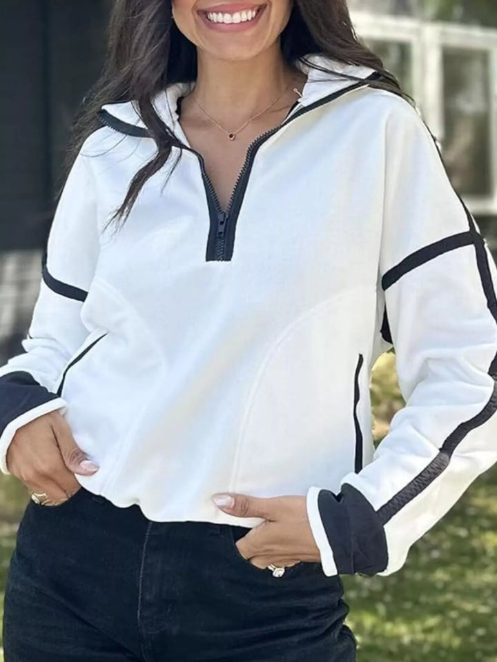 White Half-zip fleece pullover with contrast trim and zip pockets