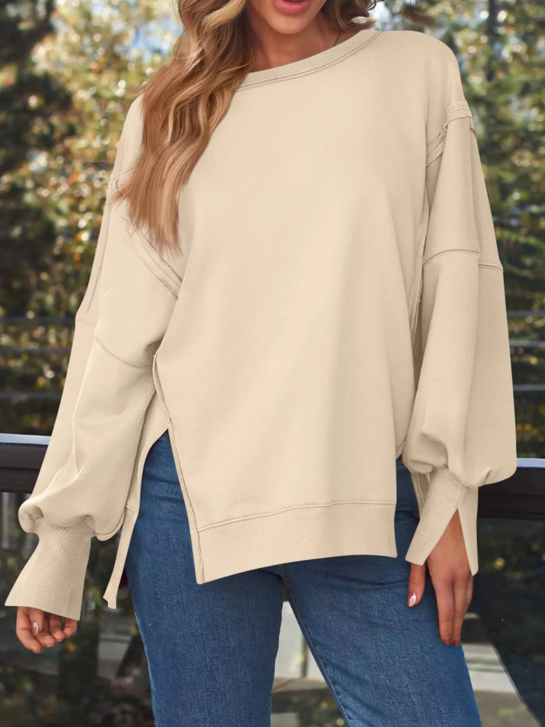 Oversized side-slit sweatshirt with exposed seams