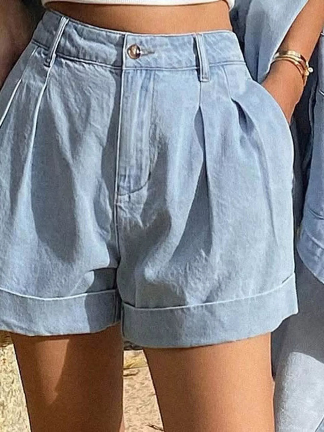 Oversized denim button-up shirt and cuffed shorts set