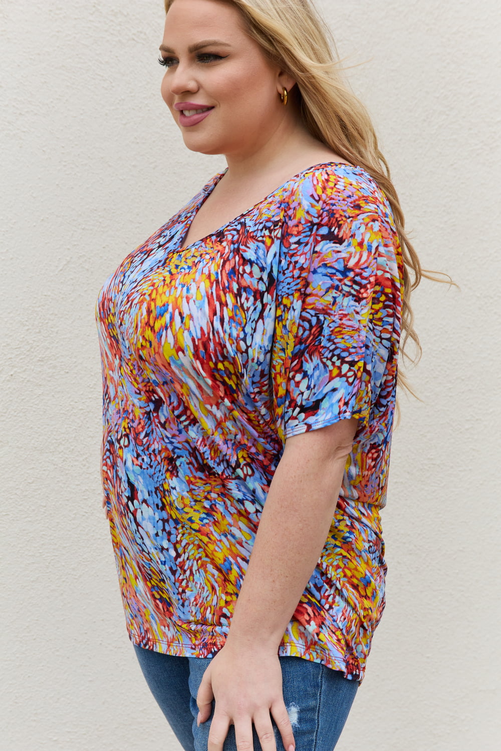 Abstract print dolman sleeve flowy V-neck top