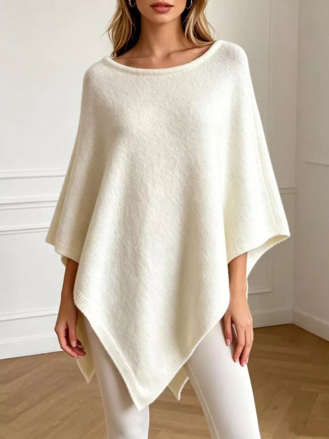 White Asymmetrical hem textured knit poncho with ribbed crew neck