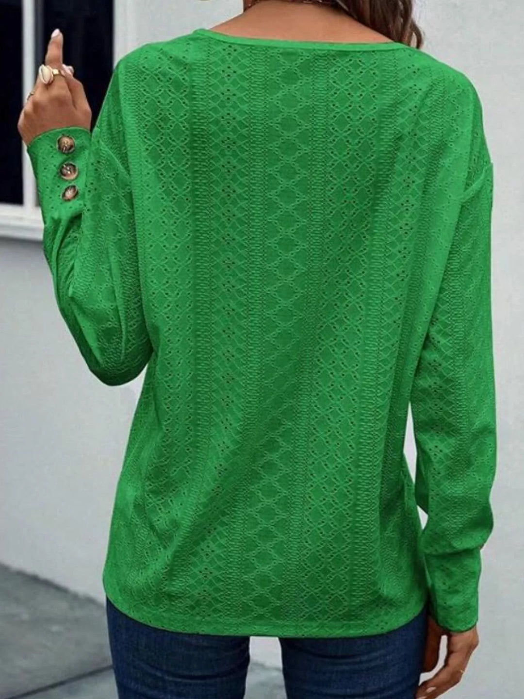 Eyelet V-neck long sleeve top with button cuffs