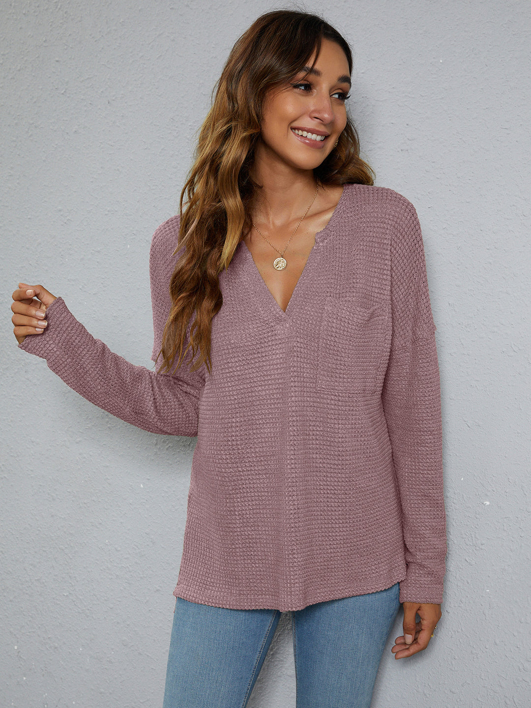 Dropped-shoulder waffle-knit V-neck top with high-low hem