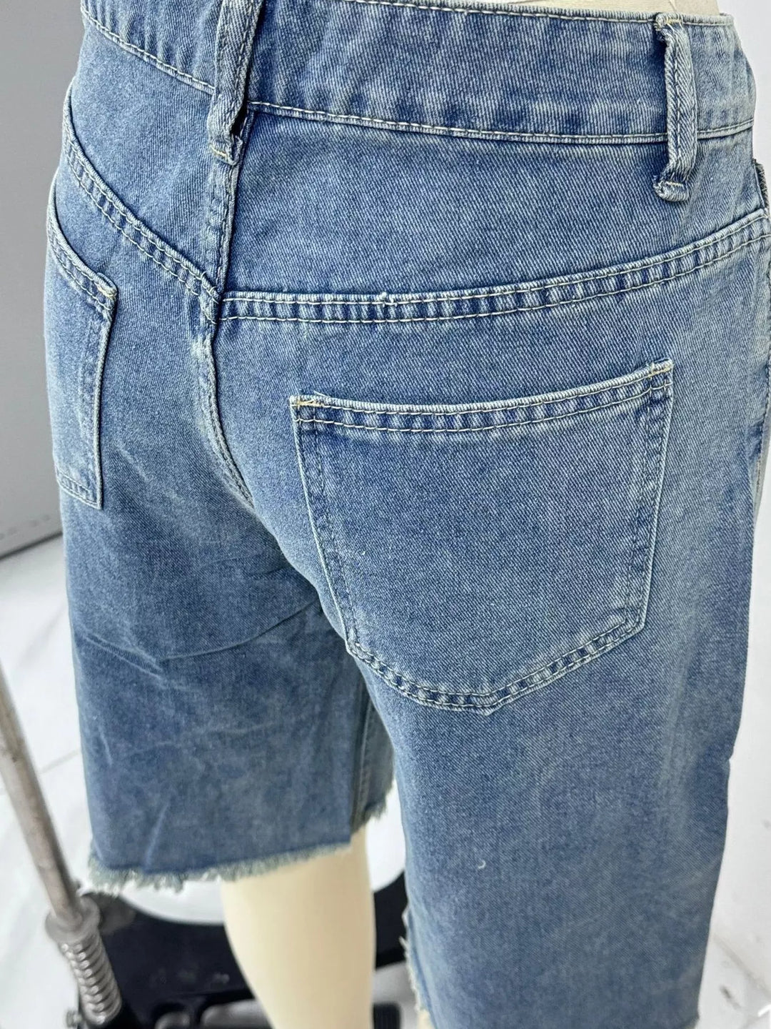 Frayed hem mid-rise relaxed Bermuda denim shorts