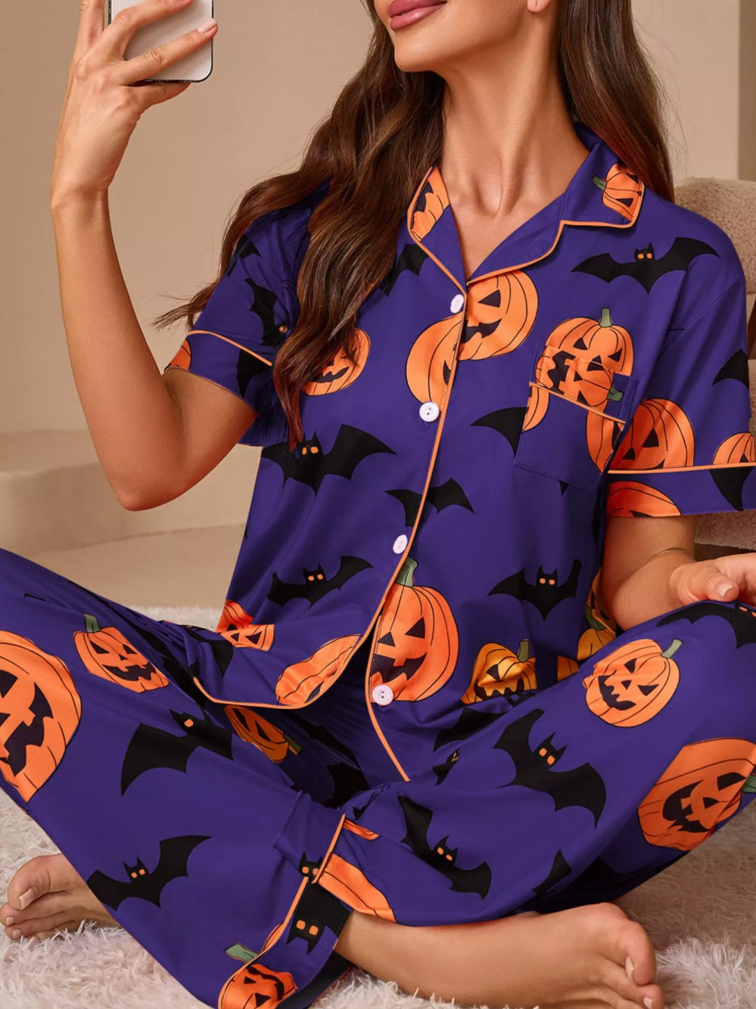 Purple Pumpkin and bat print short sleeve pajama set with piped trim