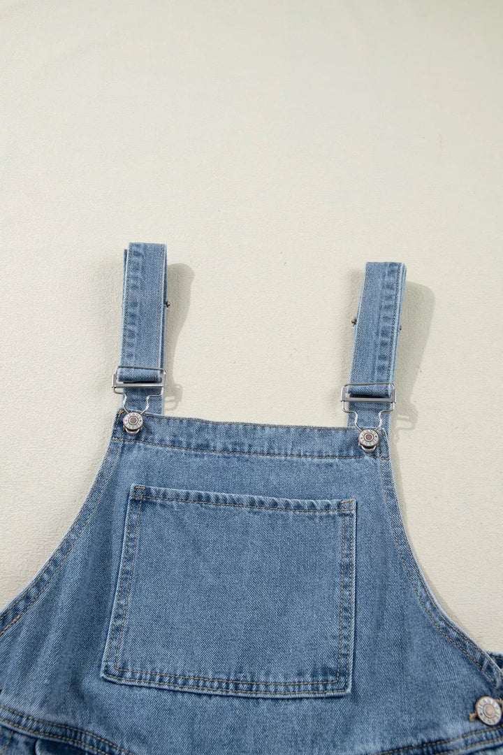 Pleated wide-leg denim overall jumpsuit with bib pocket