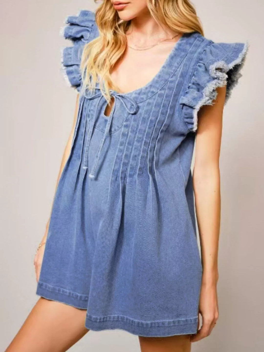 Ruffle sleeve denim romper with tie front and pintuck pleats