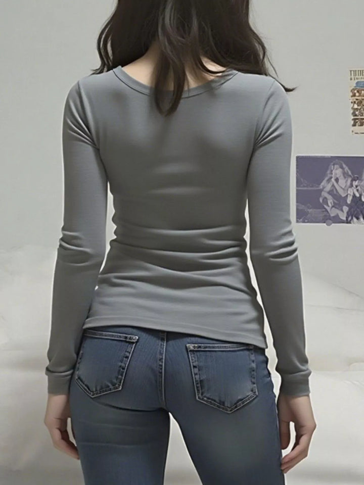Long sleeve V-neck top with lace trim neckline