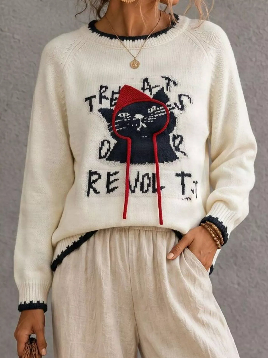 Beige Cat graphic raglan sleeve knit sweater with contrast trim