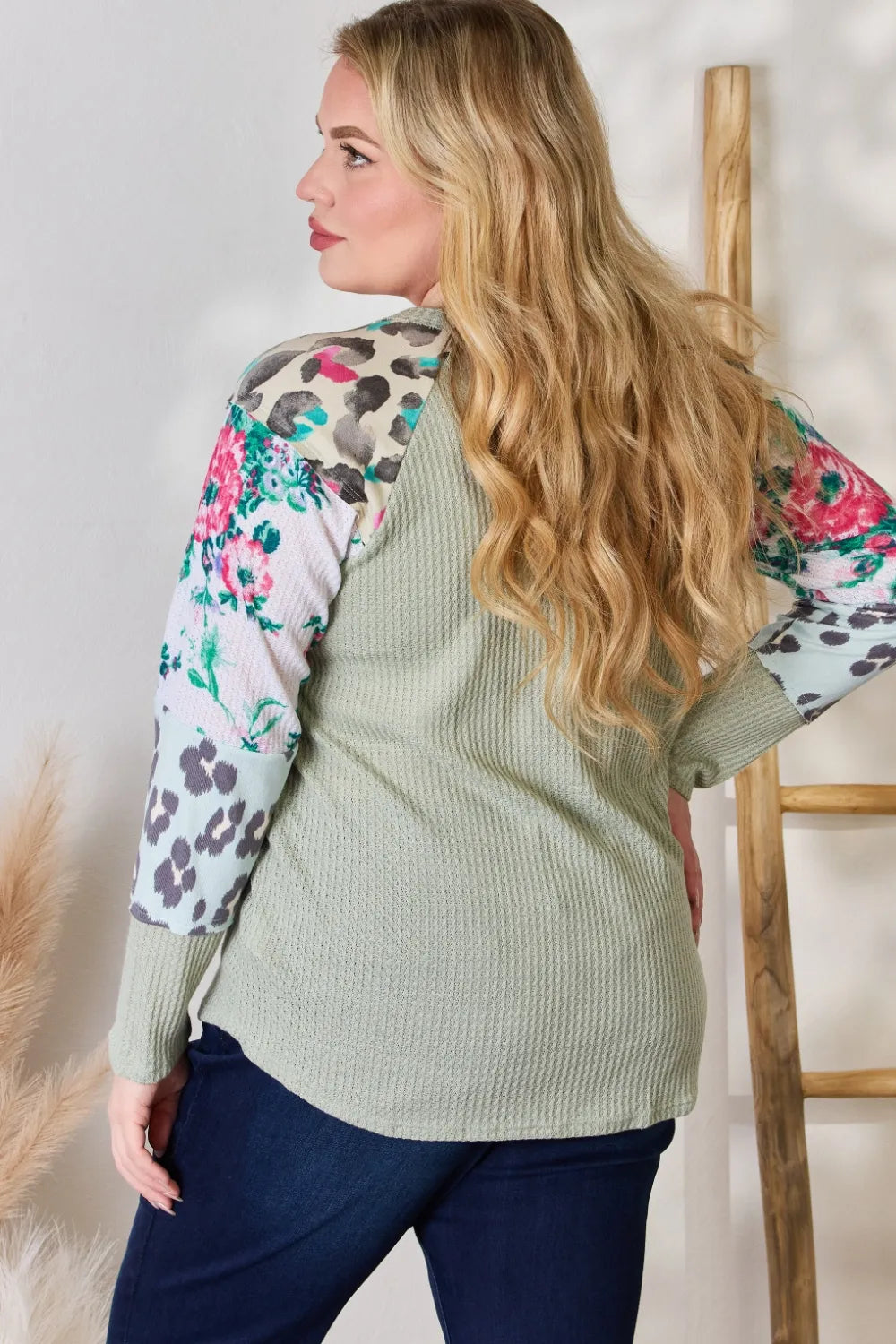 Waffle knit top with floral and leopard print sleeves