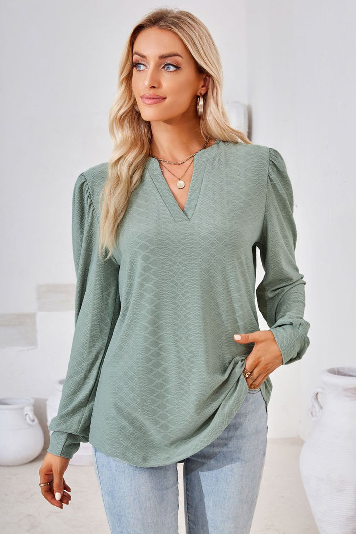 Textured knit split-neck puff sleeve blouse