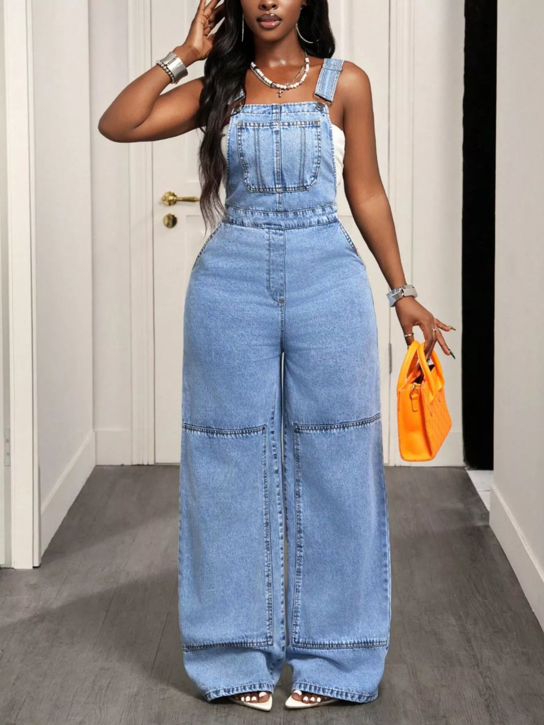 Wide leg denim overalls with bib pocket and side buttons