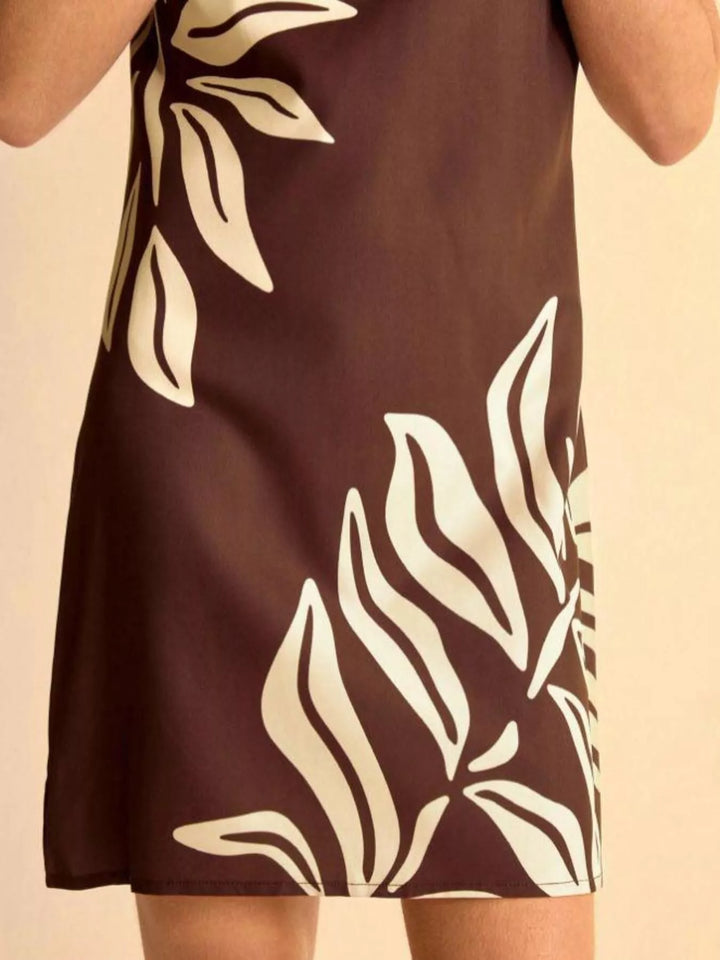 Tropical leaf print sleeveless mini dress