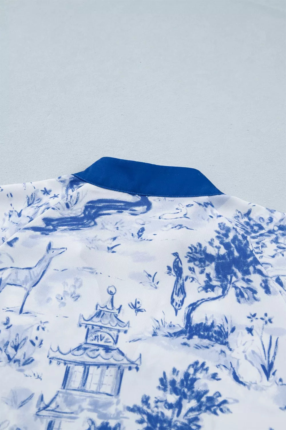 Scenic toile print V-neck raglan sleeve blouse