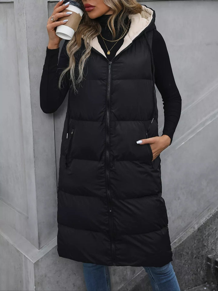 Longline hooded puffer vest with zip pockets