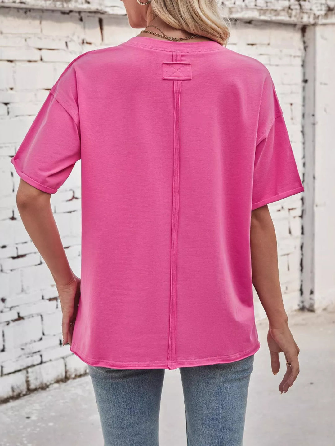 Drop-shoulder loose-fit crew neck tee with cuffed sleeves