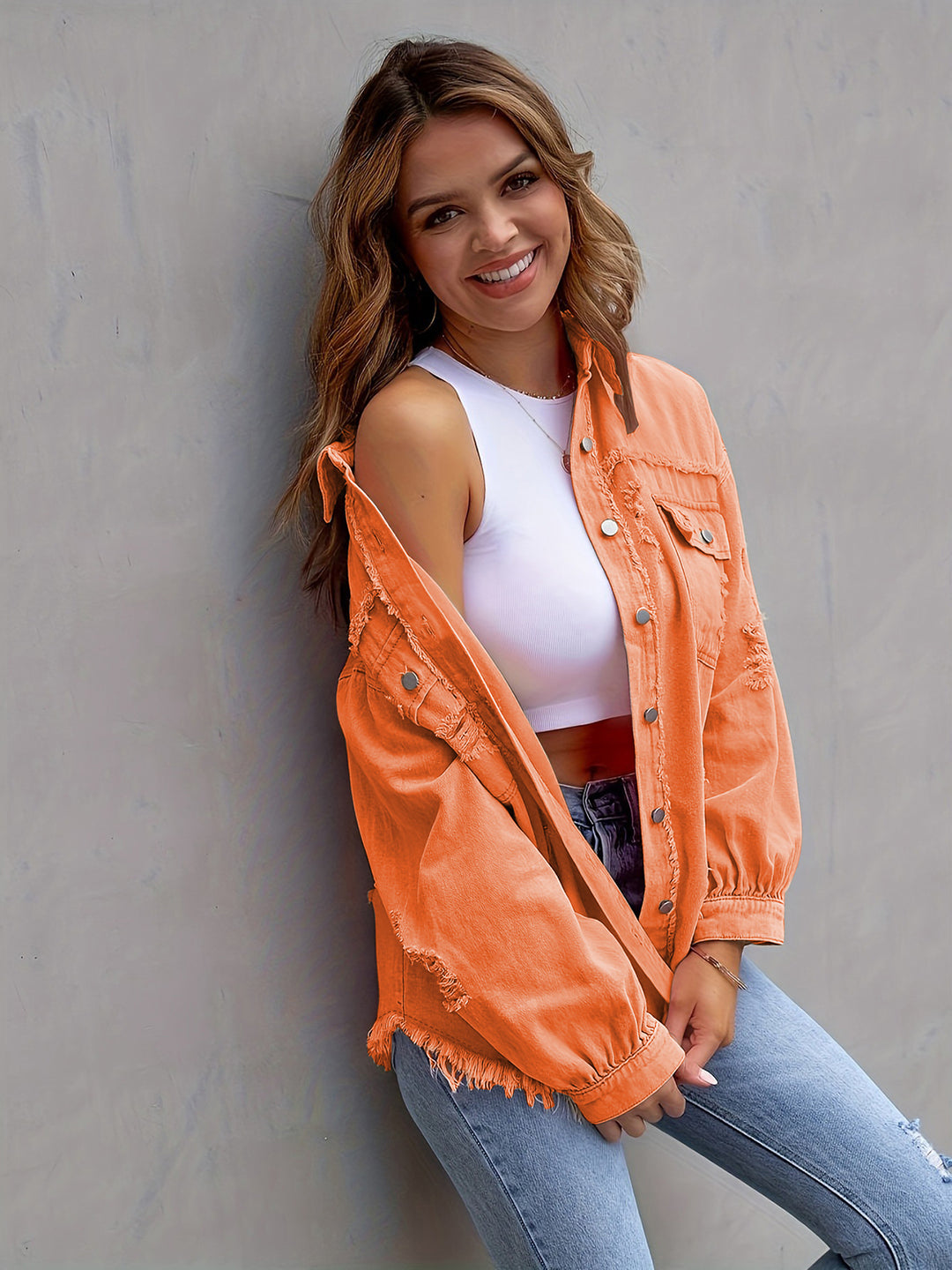 Distressed drop shoulder denim jacket with fringe hem