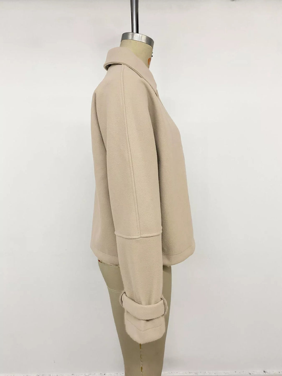 Cropped collared button-up jacket with cuff tabs
