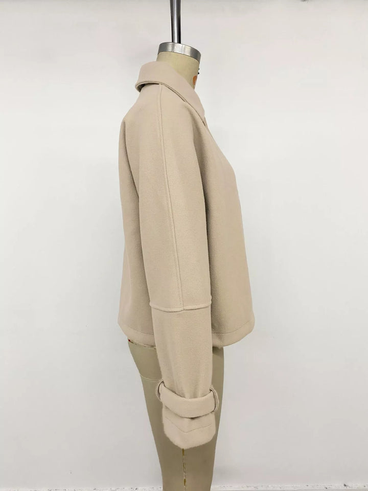 Cropped collared button-up jacket with cuff tabs