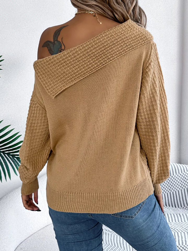 Cable knit one-shoulder sweater with fold-over ribbed collar