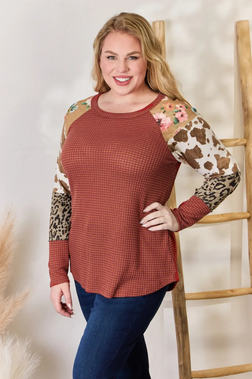 Waffle-knit top with leopard and floral print sleeves