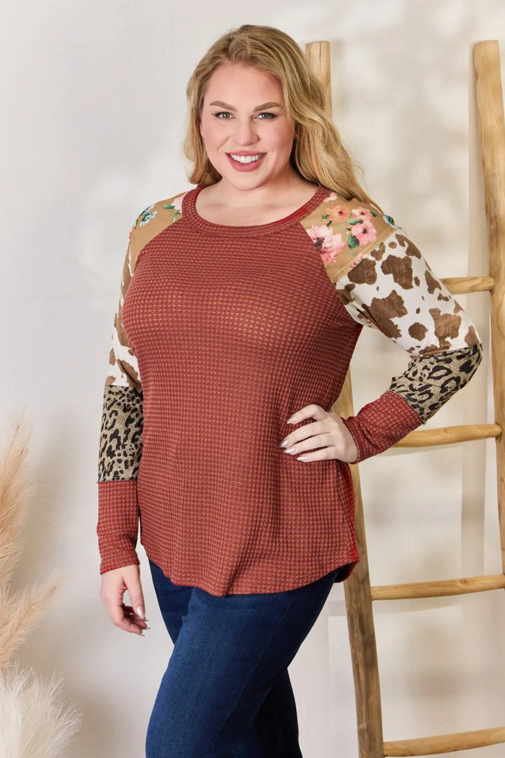 Waffle-knit top with leopard and floral print sleeves