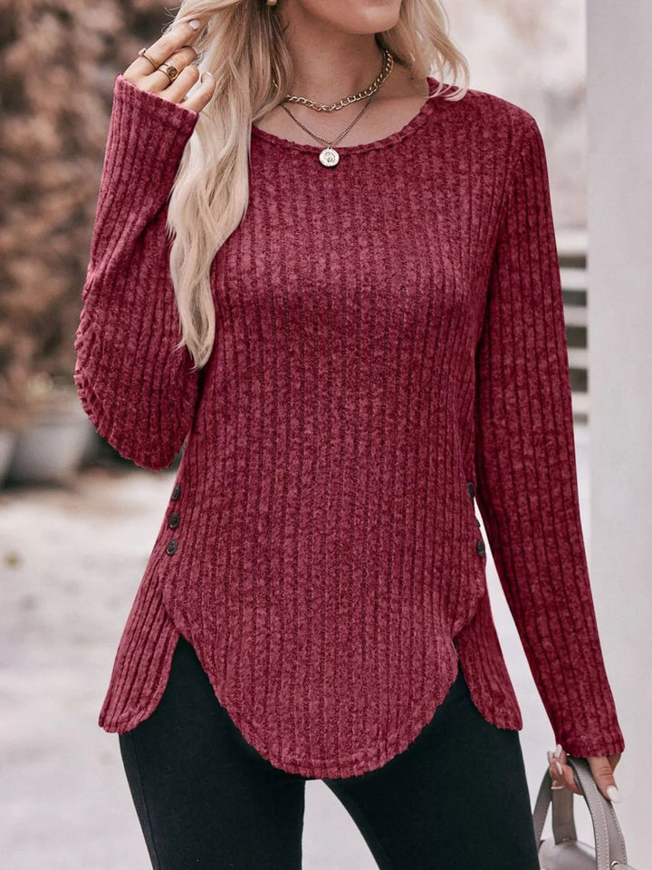 Ribbed knit long sleeve top with side button hem