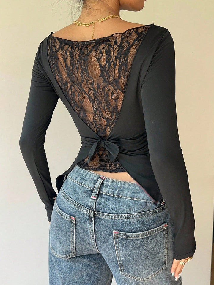 Ruched waist long sleeve top with lace back and bow detail