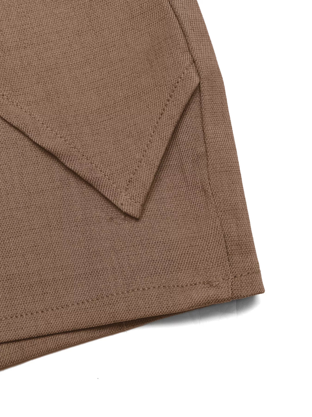 Twist-front high-rise mini skort with gold ring detail