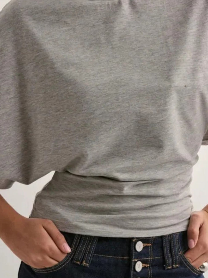 Batwing sleeve crop top with fitted waist and crew neck