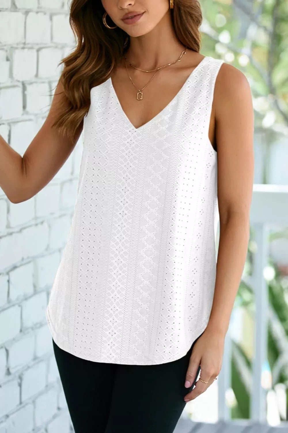 Eyelet knit V-neck tank top with curved hem