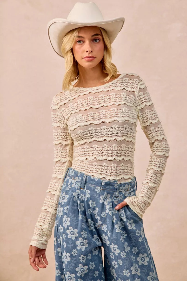 CREAM Floral lace long sleeve top with tiered ruffle rows