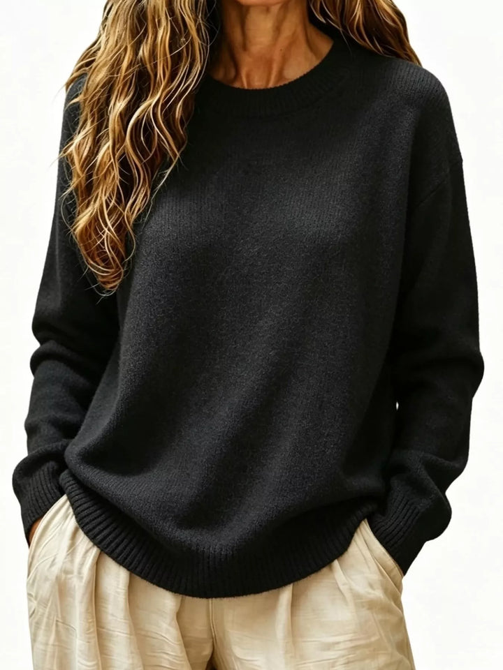 Black Soft brushed knit sweater with ribbed cuffs and drop shoulders