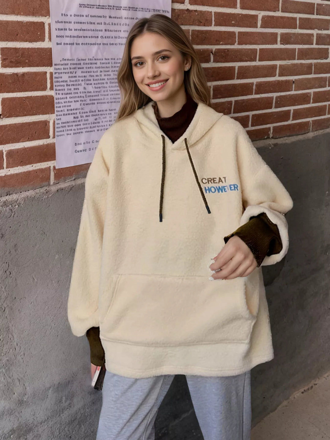 Oversized sherpa hoodie with kangaroo pocket and drawstring hood