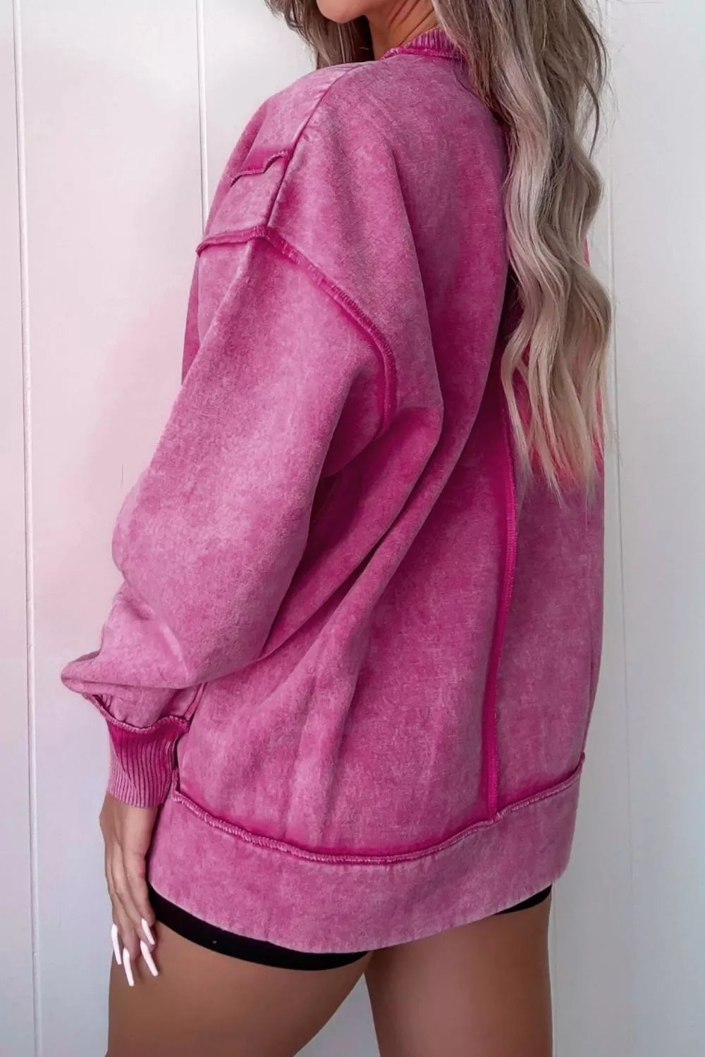 Mineral wash exposed seam side slit sweatshirt