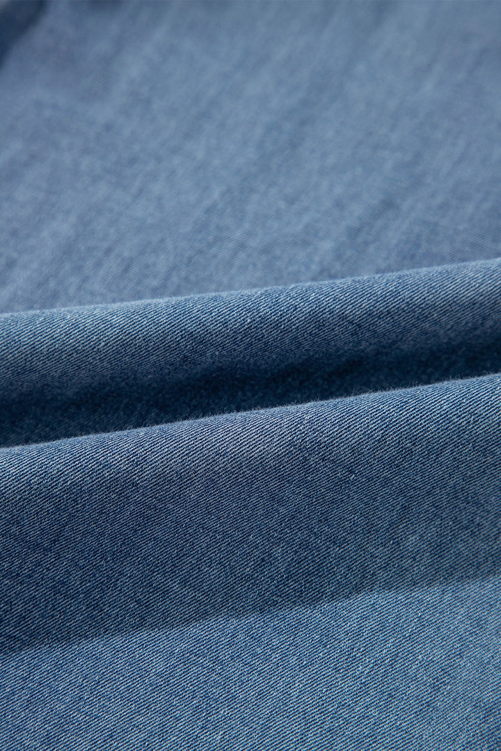 Pleated high-rise wide-leg jeans with deep pockets
