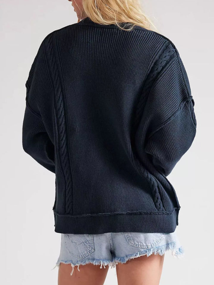 Double-breasted cable knit cardigan with raw hem