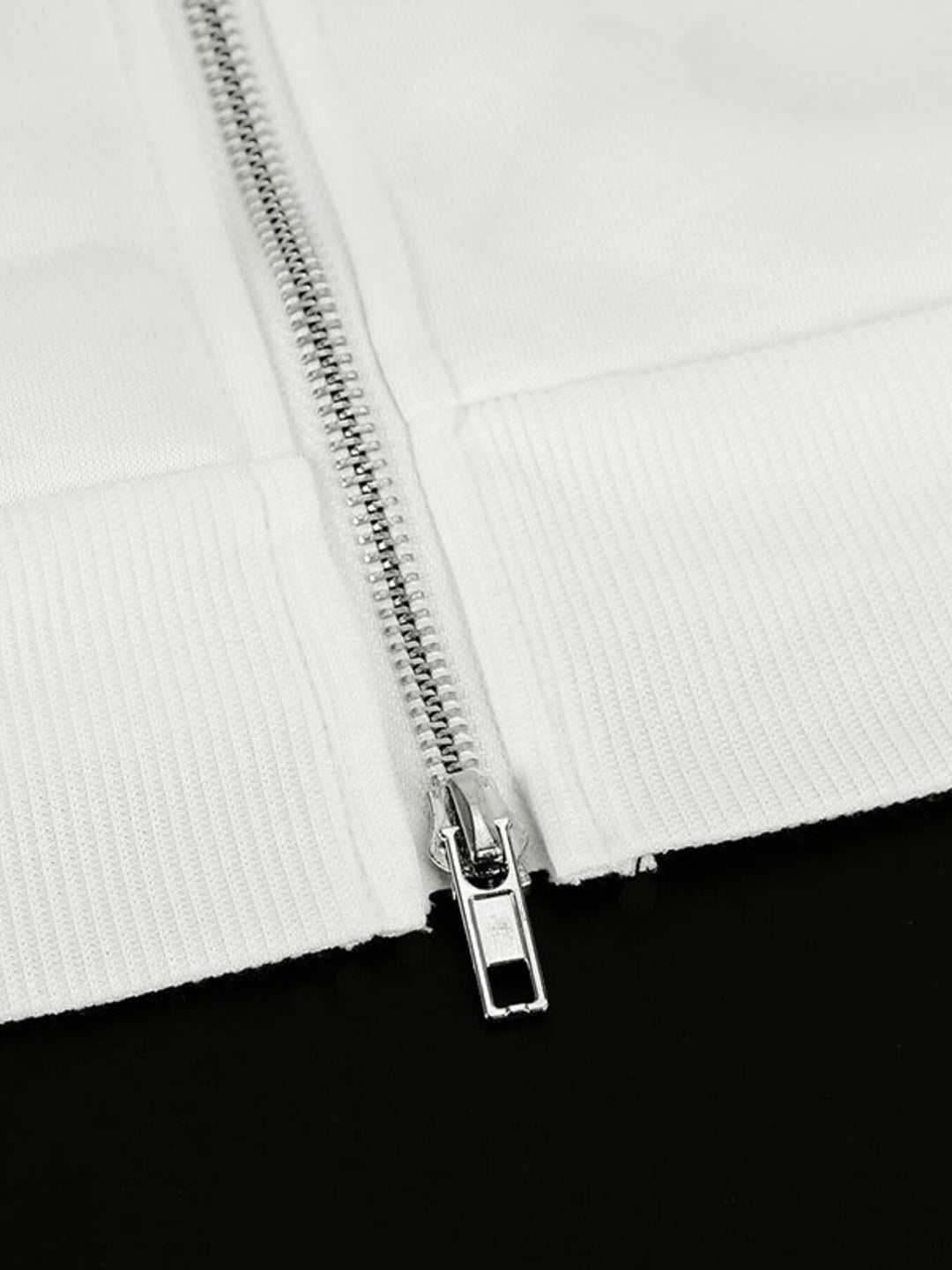 Zip-up hoodie with striped sleeves and bow detail