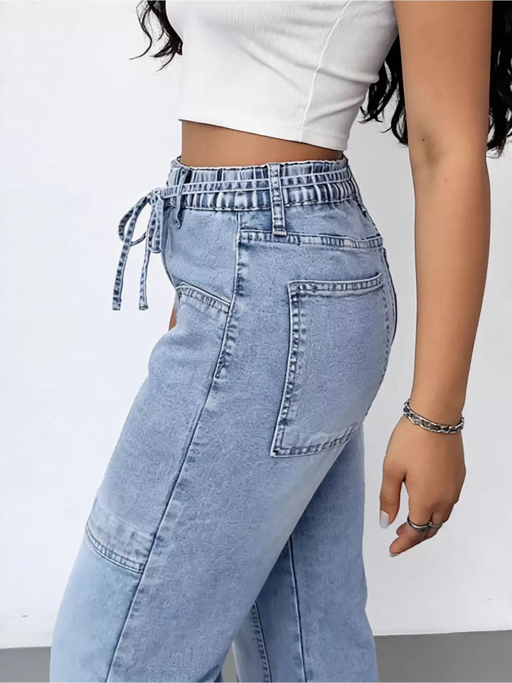 High-rise wide-leg cargo jeans with tie waist