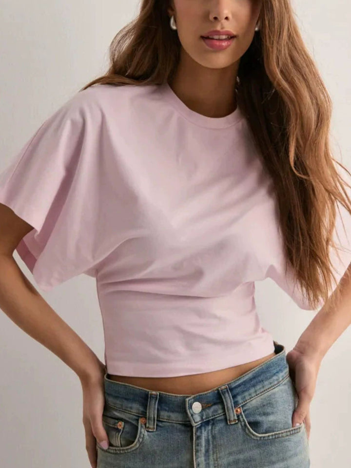 Blush Pink Batwing sleeve crop top with fitted waist and crew neck