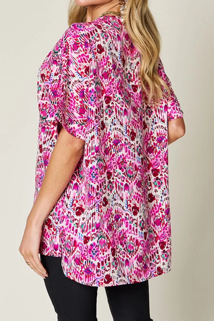 Abstract print V-neck short sleeve tunic blouse