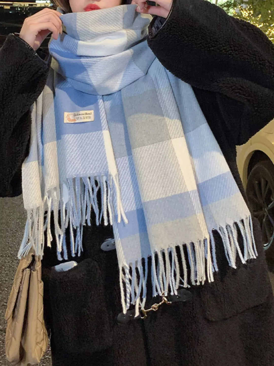 Oversized plaid wool scarf with fringe trim