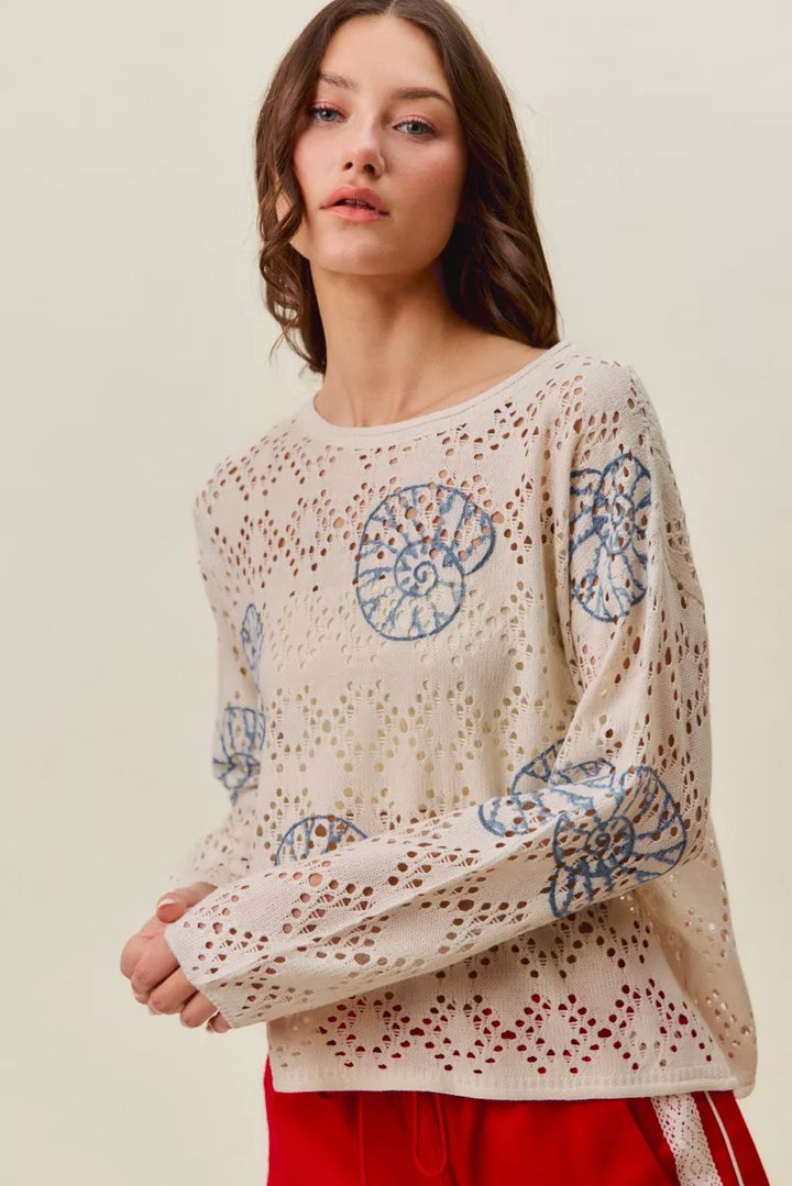 Seashell motif openwork knit long sleeve top